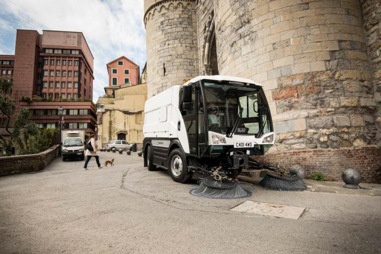 C401 compact sweeper in a city
